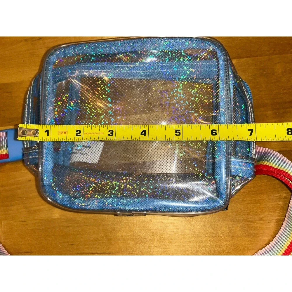 Girls Clear crossbody purse with blue trim and adjustable rainbow strap